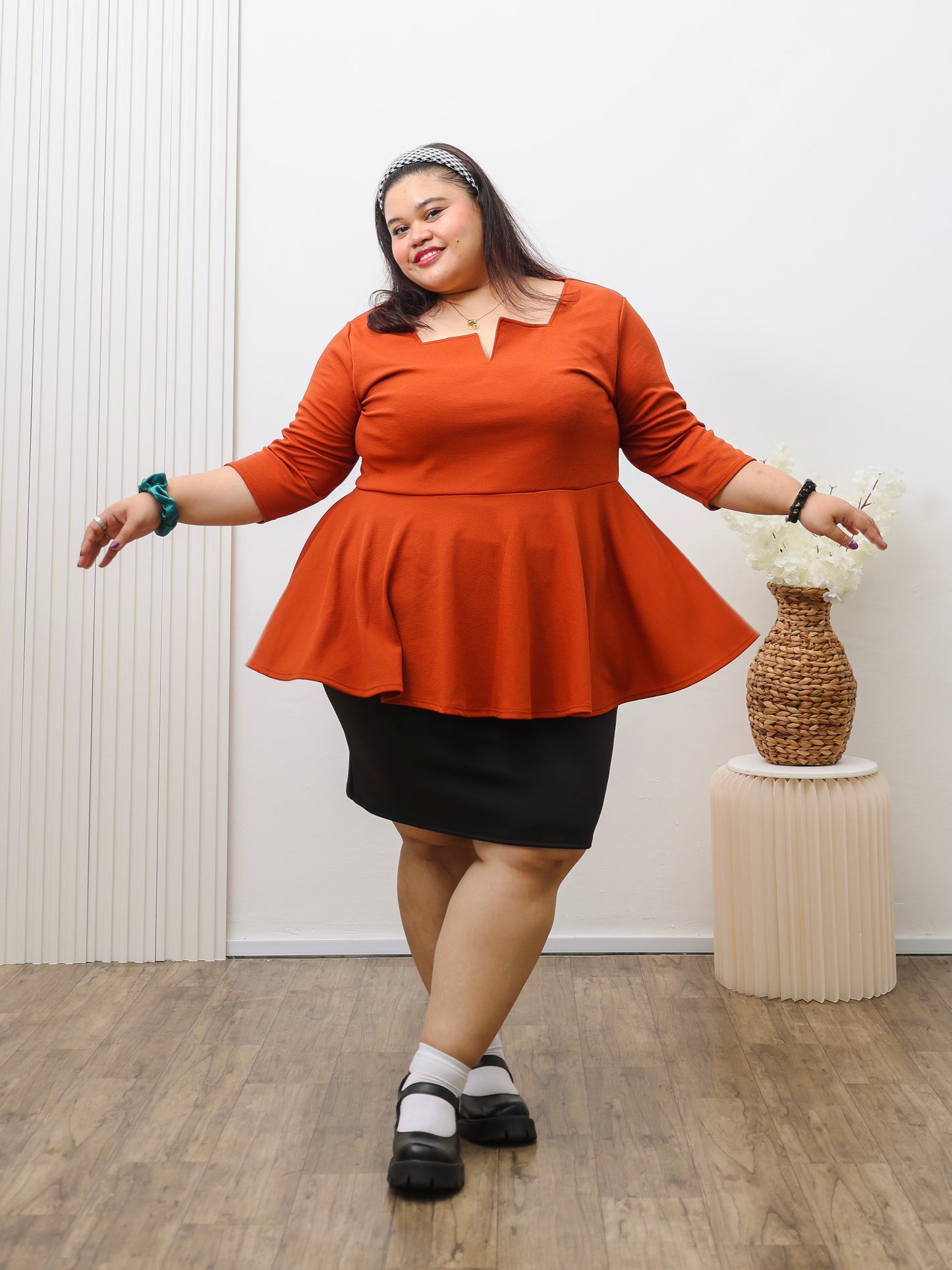 Notch Neck Peplum Top